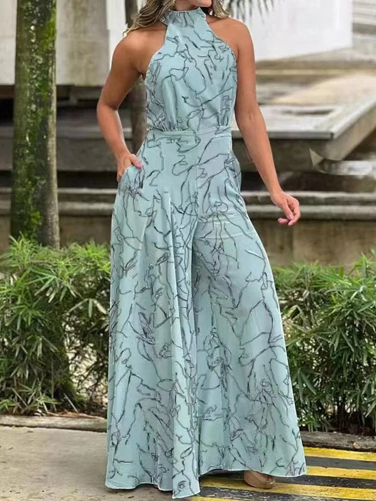 Elegant Halter Neck Jumpsuit: Casual Printed Design with Sleeveless Tie, Wide Leg Pants