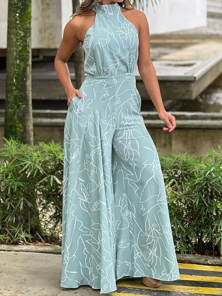 Elegant Halter Neck Jumpsuit: Casual Printed Design with Sleeveless Tie, Wide Leg Pants