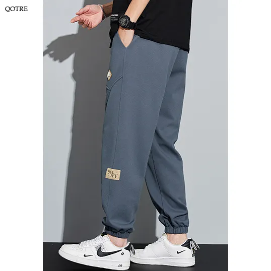 Tapered Knitted Sports Patched Pocket Sweatpant